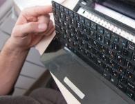 We disassemble and clean the laptop keyboard